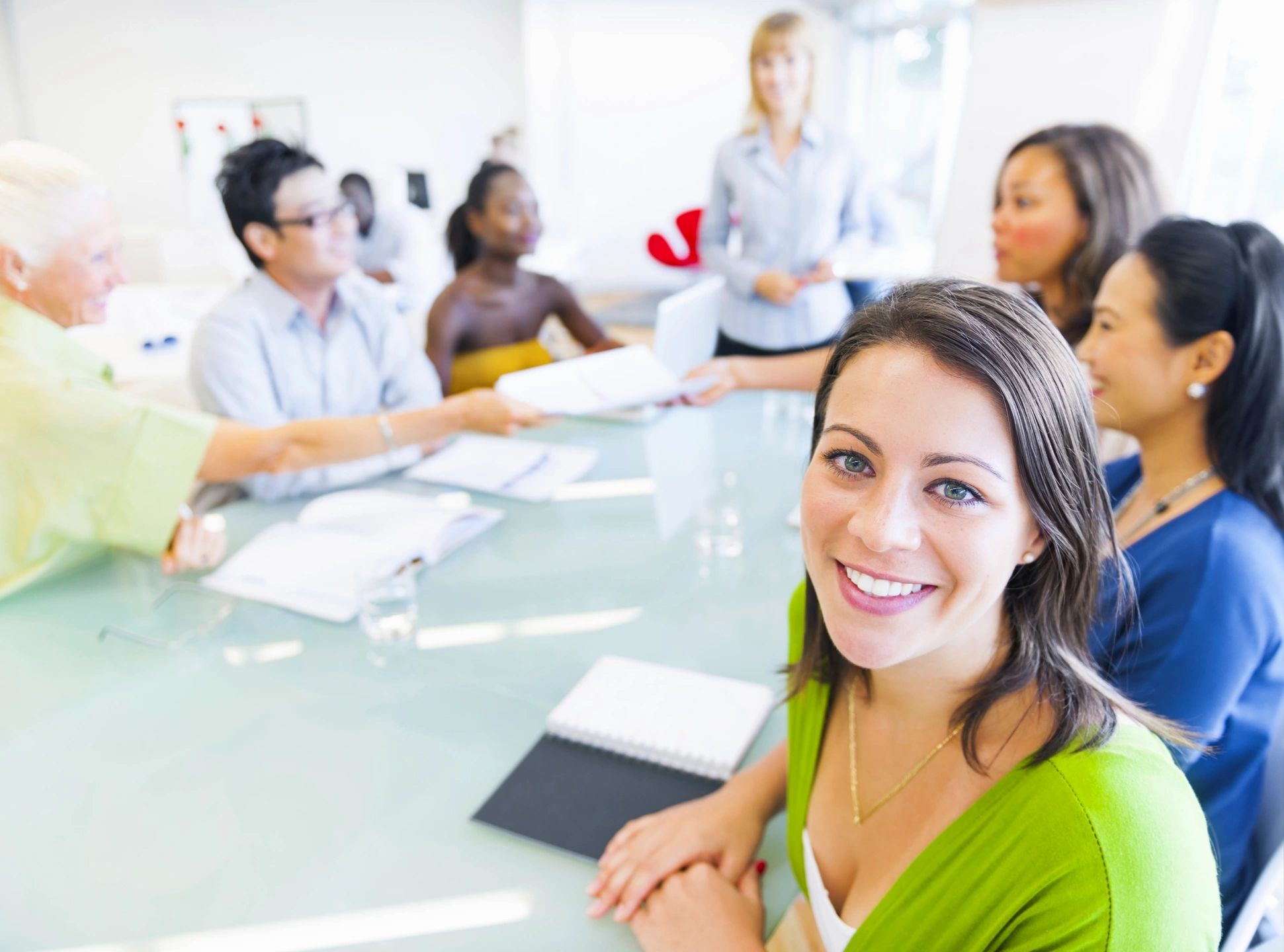Consulting team collaborating around a conference table